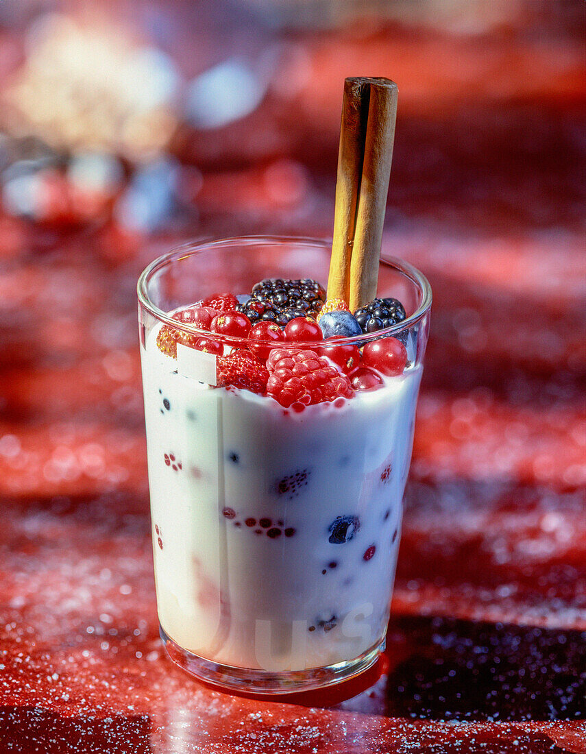 Quark with berries in a glass