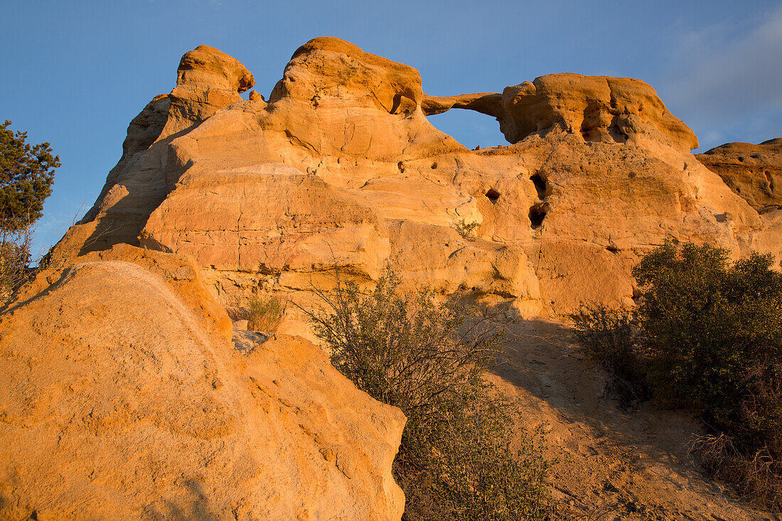 Graceful Arch at sunrise in a remote desert area near Aztec in northwestern New Mexico.