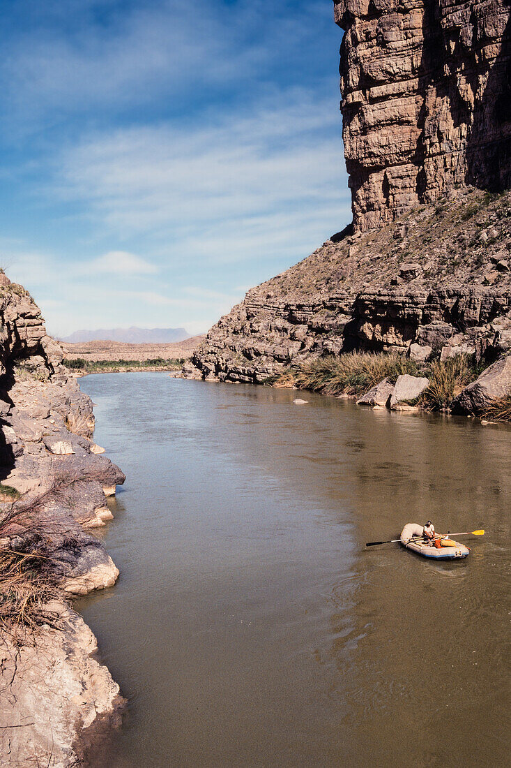 River rafting on the Rio Grande River in Santa Elena Canyon in Big Bend National Park with Mexico at right.