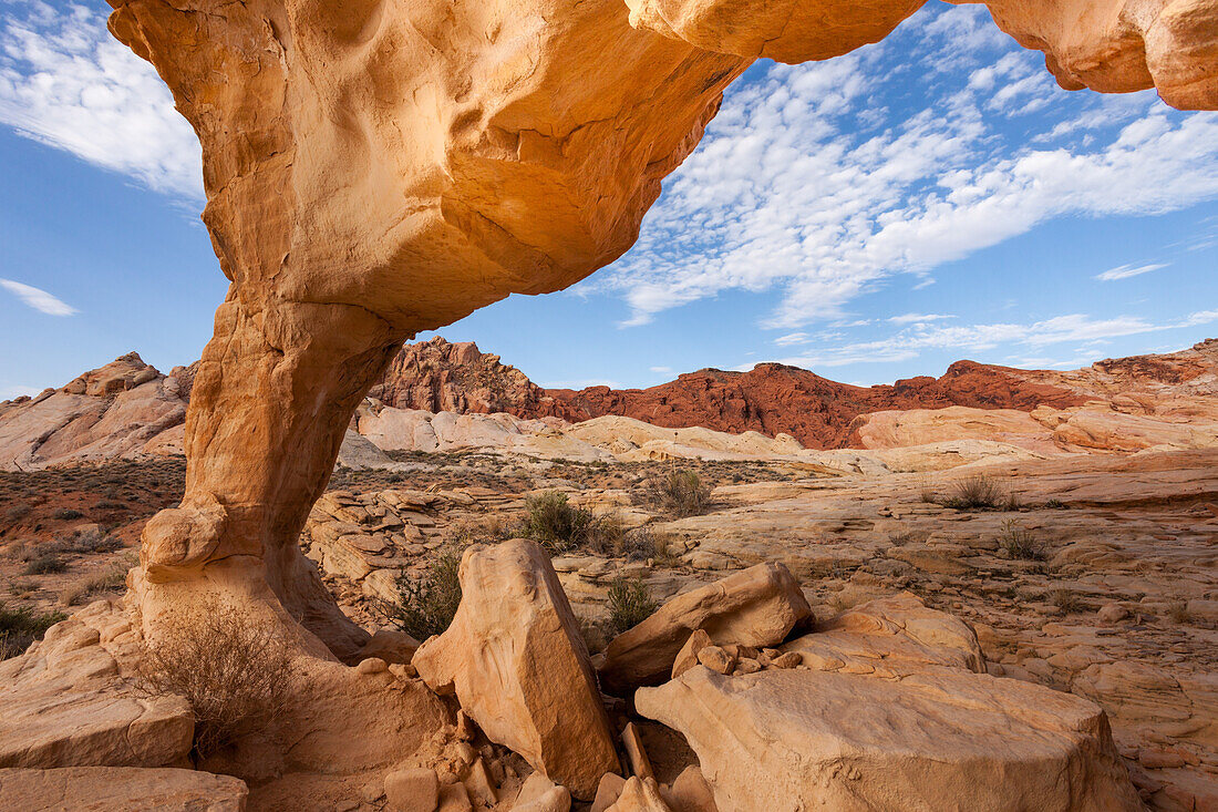 An unnamed natural arch in the eroded Aztec sandstone of Valley of Fire State Park in Nevada.