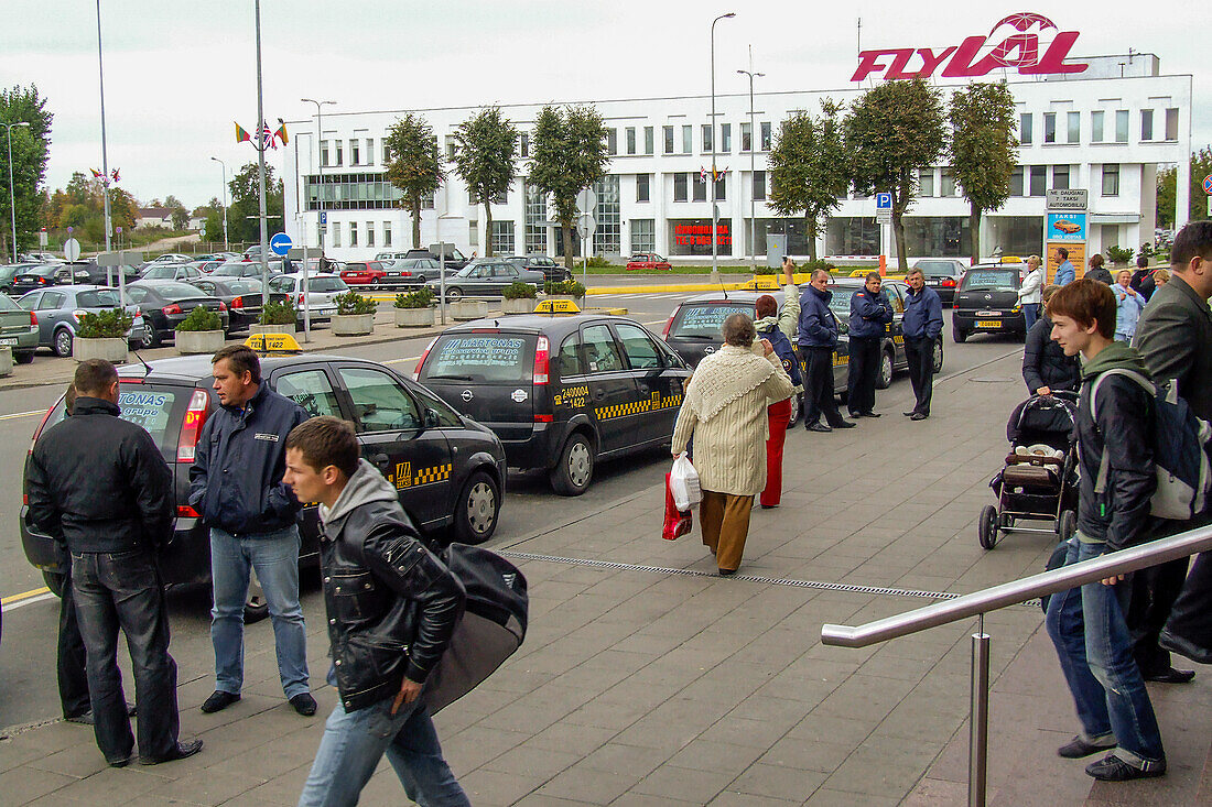 Taxis wait in front of the Vilnius International Airport in Lithuania.