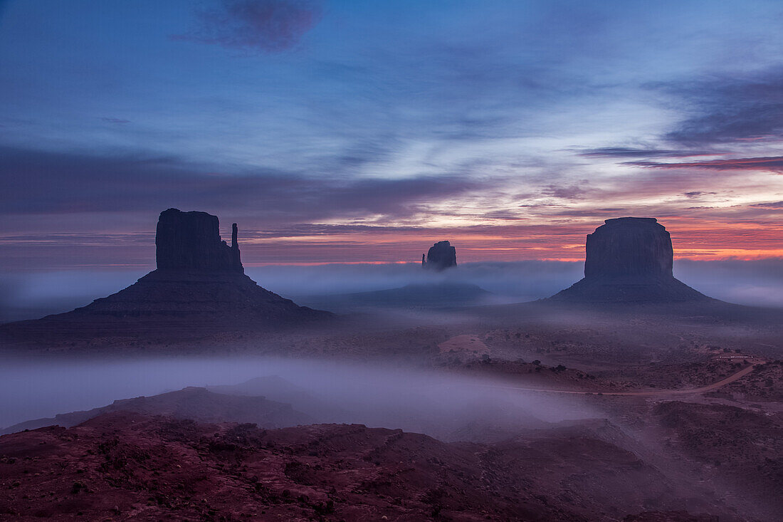 Foggy sunrise in the Monument Valley Navajo Tribal Park in Arizona.