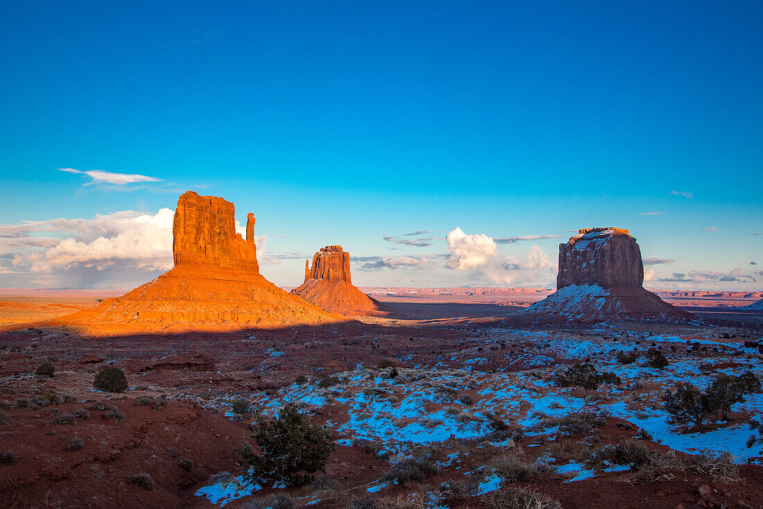 The Mittens and Merrick Butte in winter in the Monument Valley Navajo Tribal Park in Arizona.