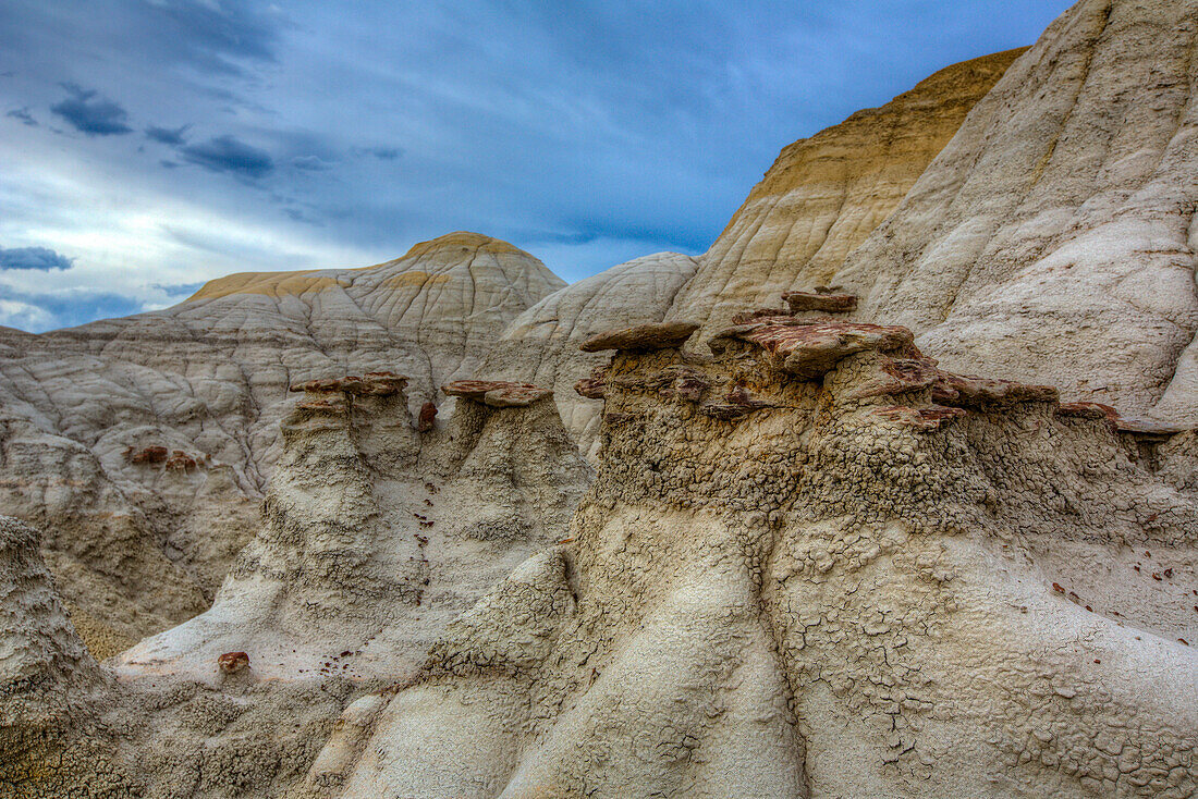 Bizarre landscape of colorful eroded clay hills in the badlands in the San Juan Basin in New Mexico.