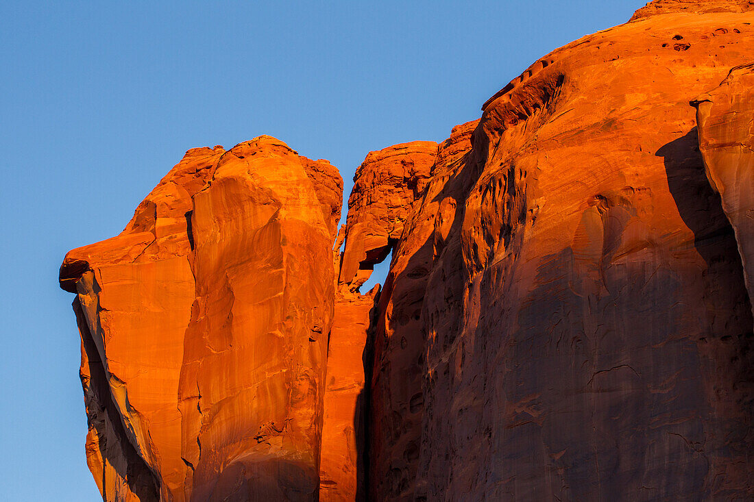 A small sandstone arch on Elephant Butte in the Monument Valley Navajo Tribal Park in Arizona.