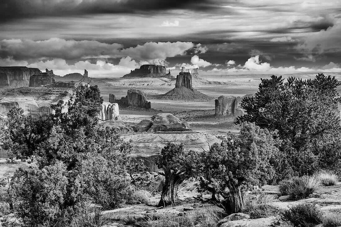 Black and white stormy sunrise in Monument Valley Navajo Tribal Park in Arizona. View from Hunt's Mesa.