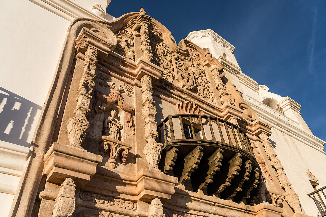 Detail of the facade and wooden balcony of the Mission San Xavier del Bac, Tucson Arizona.