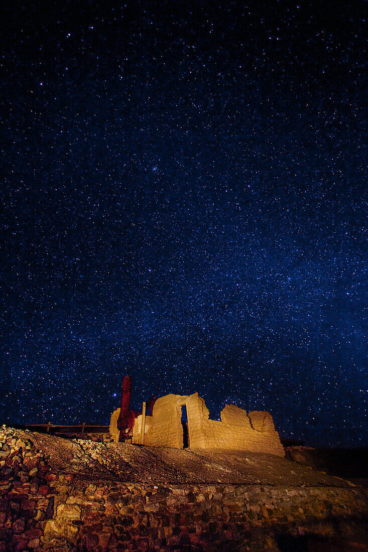 Ruins of the historic Harmony borax processing plant at night at Furnace Creek in Death Valley National Park in California.