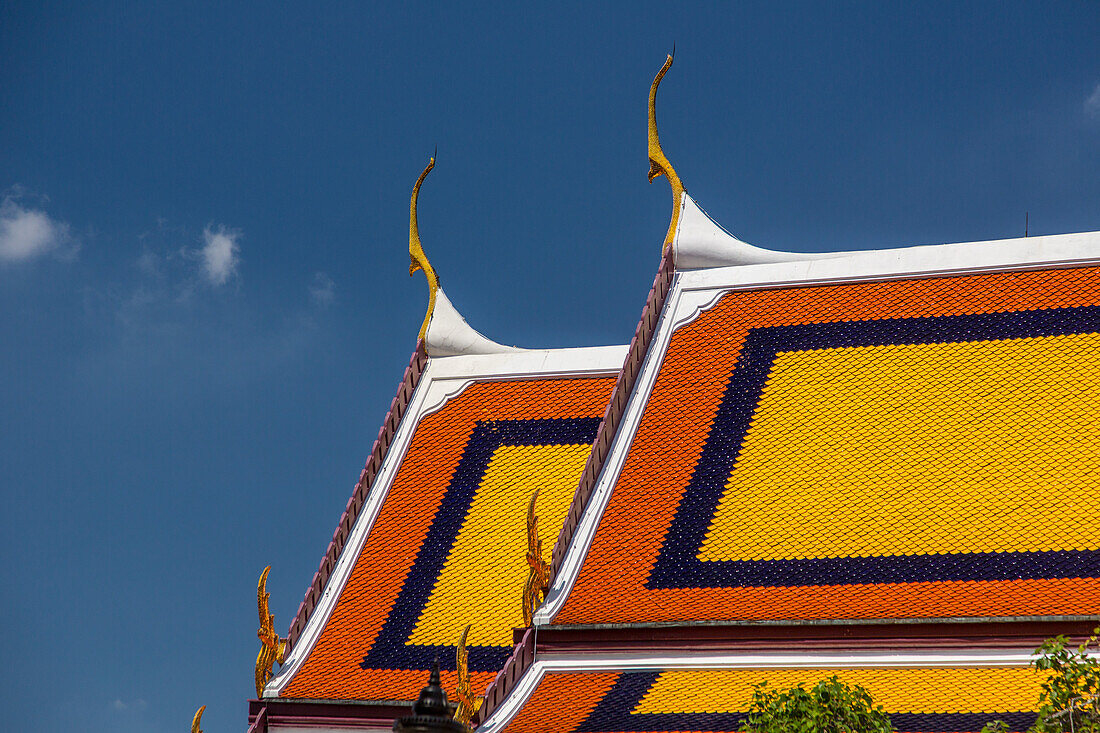 Roof detail of the Ho Phra Monthien Tham by the Temple of the Emerald Buddha at the Grand Palace complex in Bangkok, Thailand.