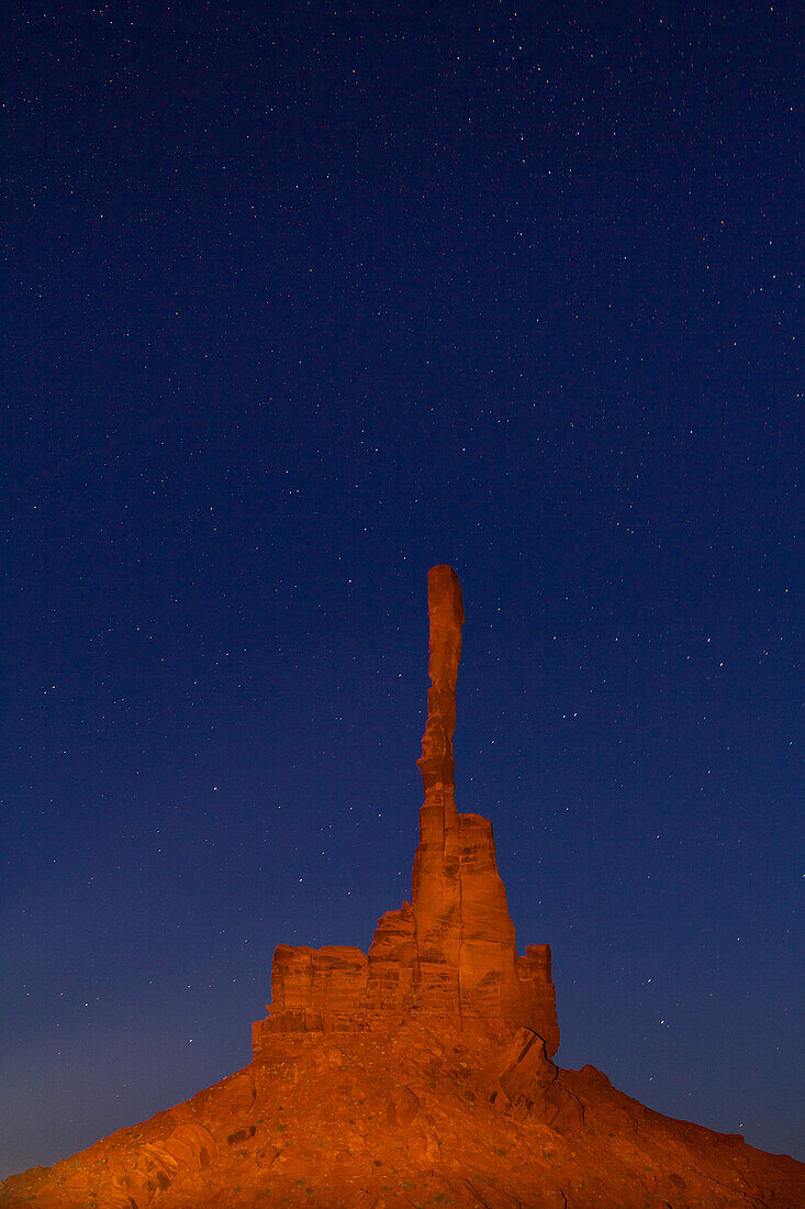 Stars over the Totem Pole at night in the Monument Valley Navajo Tribal Park in Arizona.