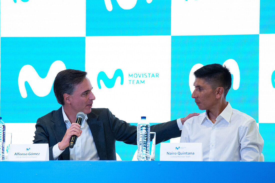 Alfonso Gomez the CEO of Telefonica Hispam (L) and cyclist Nairo Quintana (R) speak during a press conference announcing it's return to the Movistar Cycling team, in Bogota, Colombia on october 30, 2023.