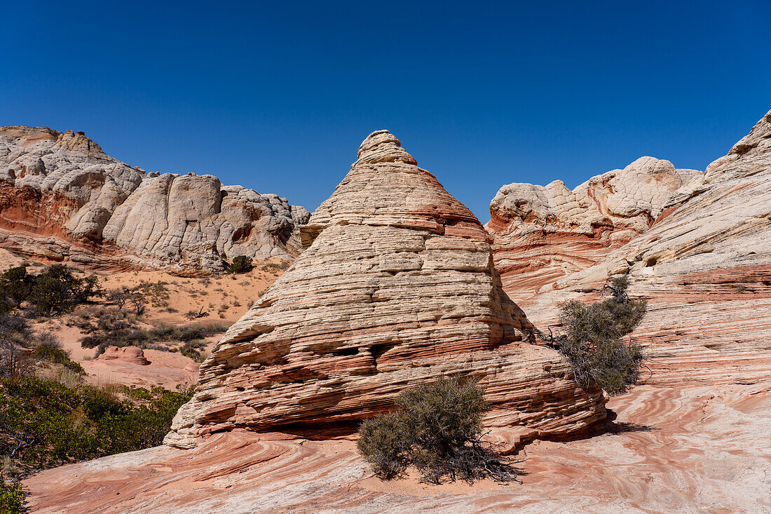 A teepee-shaped sandstone rock formation in the White Pocket Recreation Area, Vermilion Cliffs National Monument, Arizona.