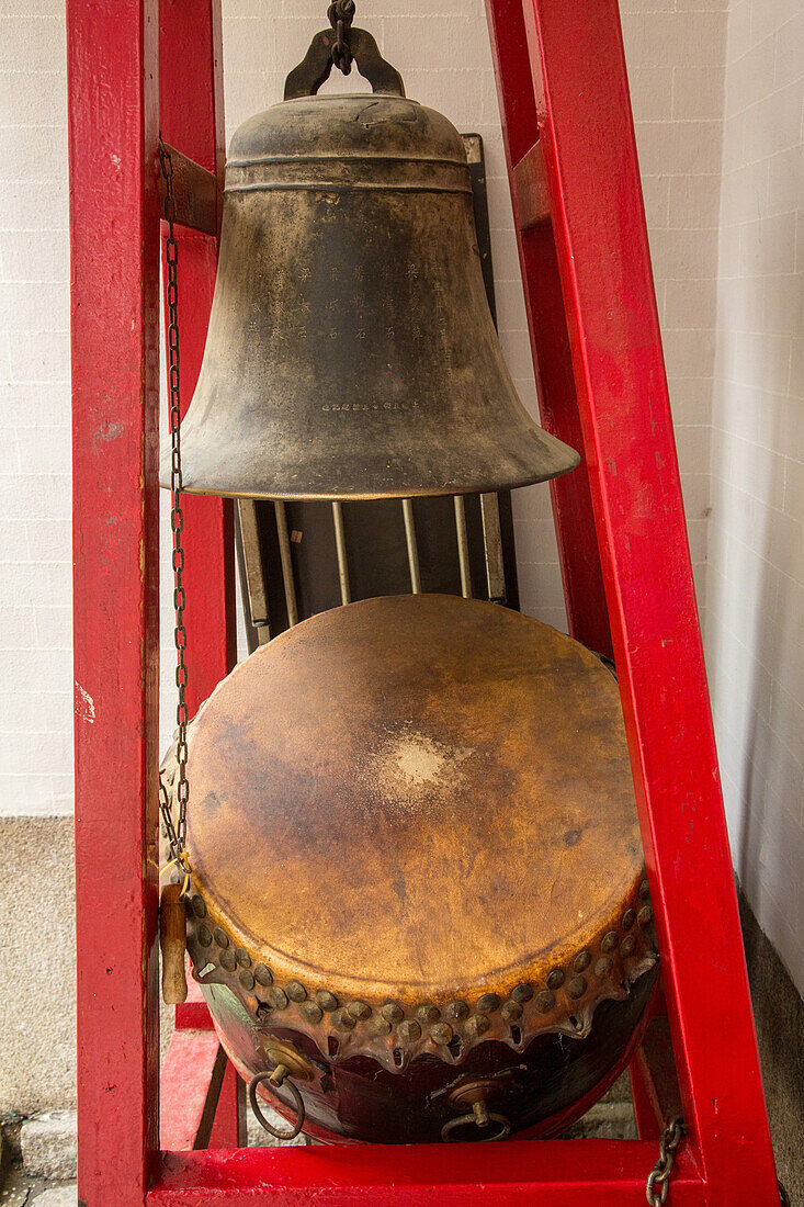 A ceremonial drum and bronze bell in the Man Mo Temple, a Buddhist temple in Hong Kong, China.