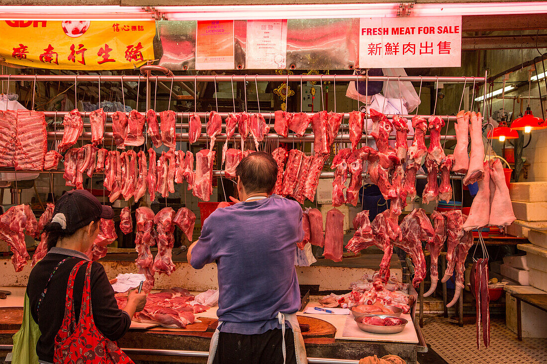 Meet for sale in a butcher shop on the street in Hong Kong, China.