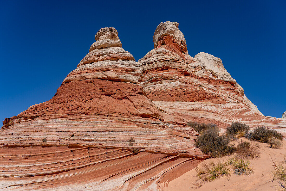 A teepee-shaped sandstone rock formation in the White Pocket Recreation Area, Vermilion Cliffs National Monument, Arizona.