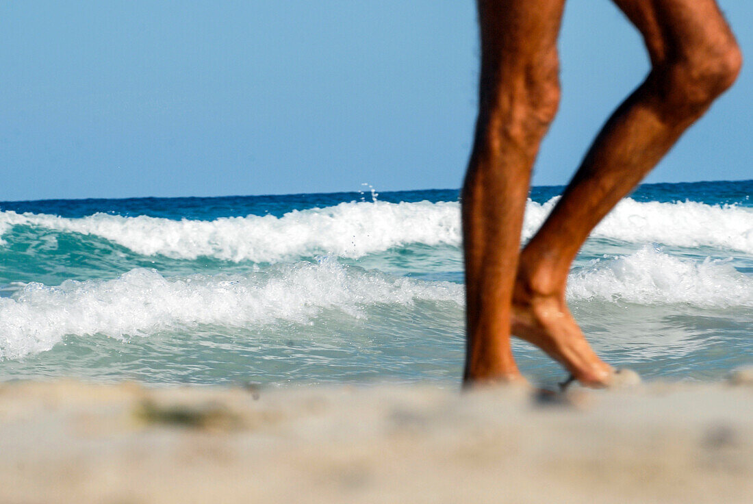 Nudist man walking in Levante beach - Playa de Llevant -, Formentera