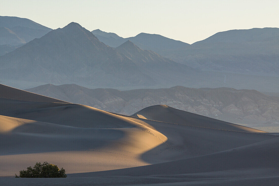 Sunrise on the Mesquite Flat sand dunes in Death Valley National Park in the Mojave Desert, California.