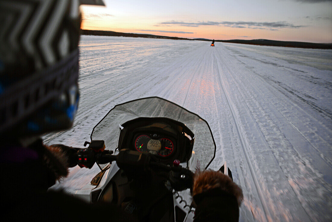 Snowmobile sunset tour with Arctic Lifestyle, Rovaniemi, Lapland, Finland.