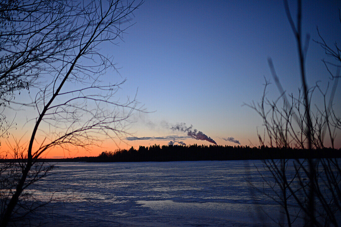 Industry smoke and frozen Gulf of Bothnia, Kemi