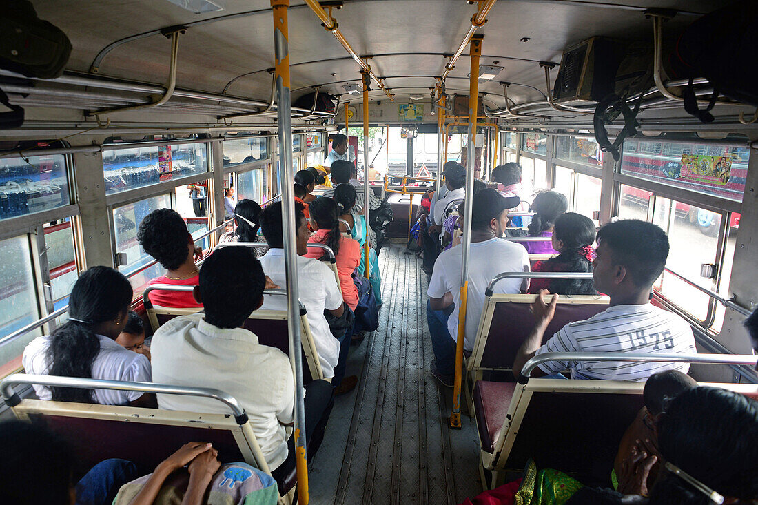 People inside a public bus in Sri Lanka