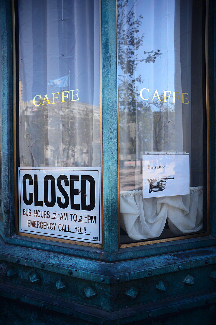 Closed sign in cafe at Market Street, San Francisco.