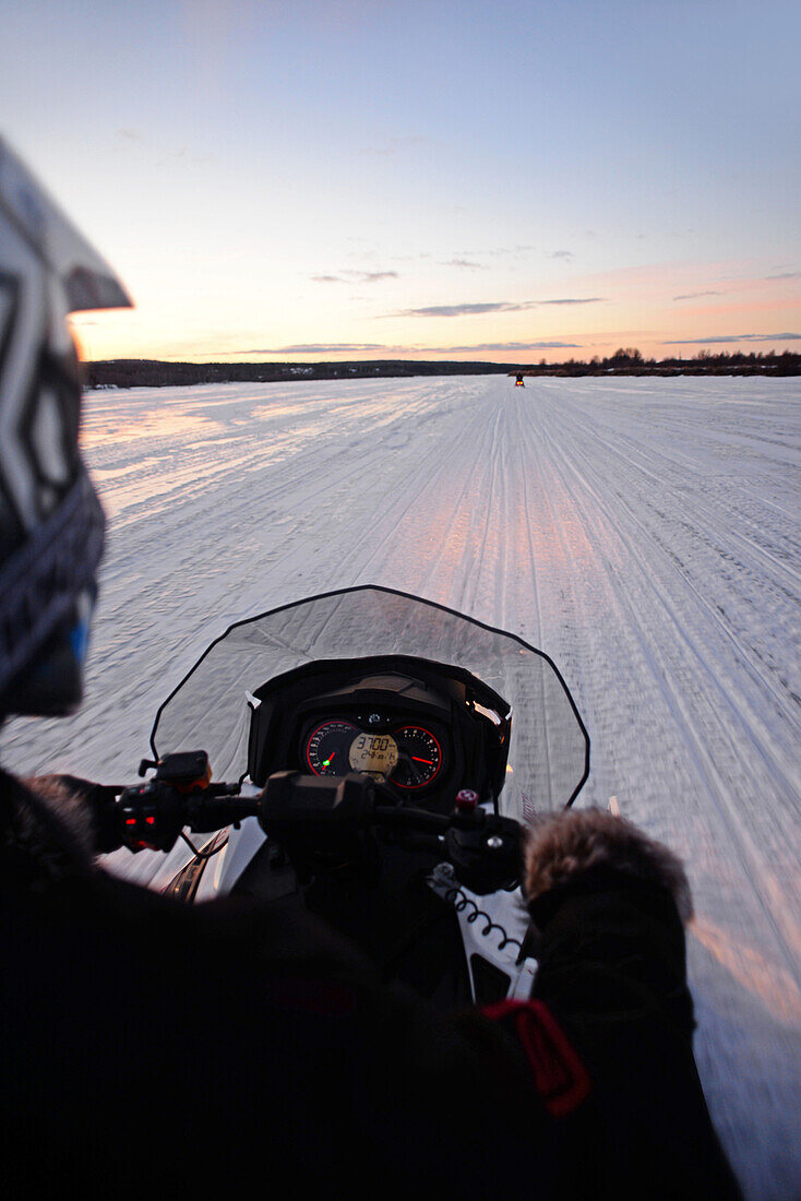 Snowmobile sunset tour with Arctic Lifestyle, Rovaniemi, Lapland, Finland.