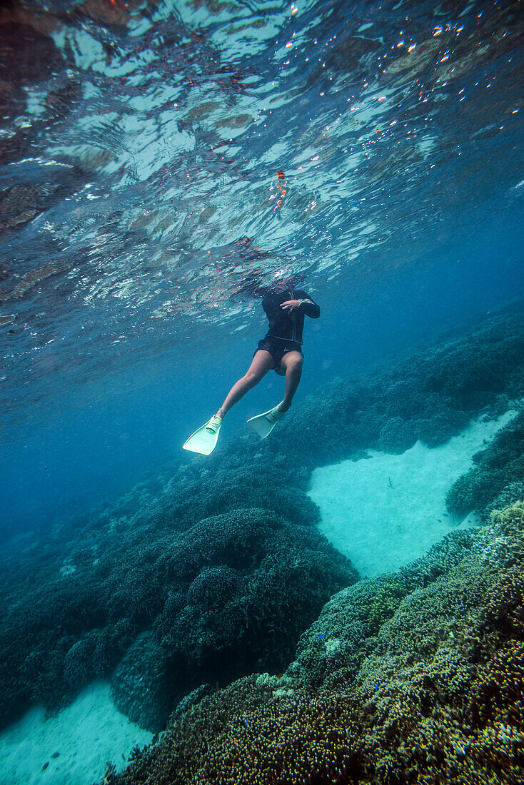 Young woman snorkeling in Ishigaki, Okinawa Prefecture, Japan