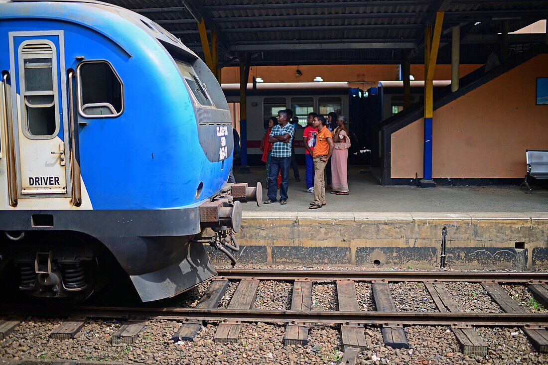 People in train station, Sri Lanka