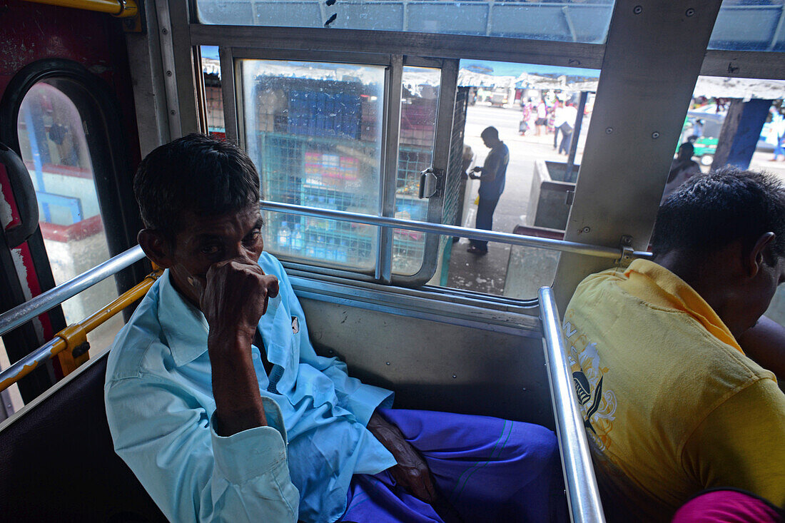 People inside a public bus in Sri Lanka