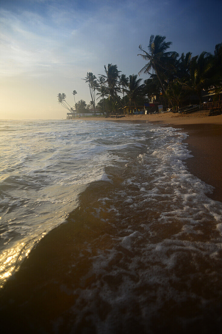 Hikkaduwa beach at sunset, Sri Lanka