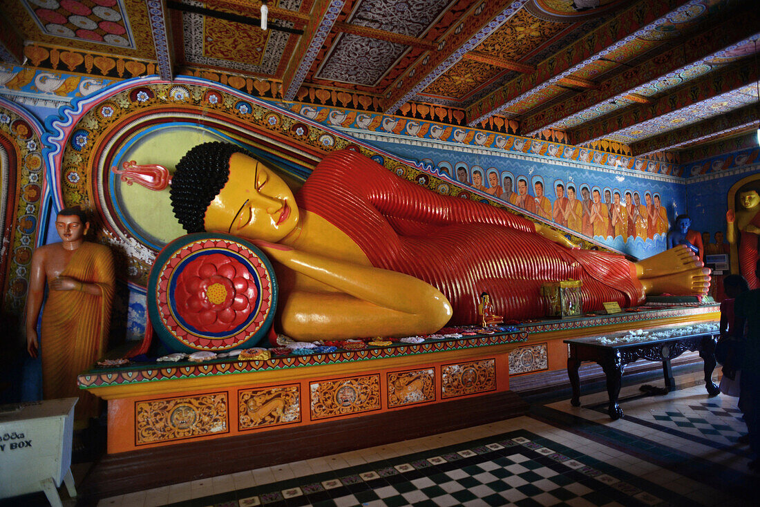 Reclining buddha statue at the Isurumuniya Temple in Anuradhapura, Sri Lanka.