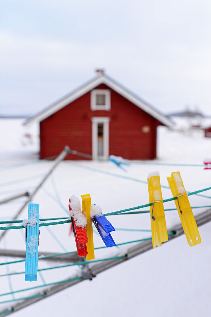 Wood cabins from VisitInari next to Lake Inari, Lapland, Finland