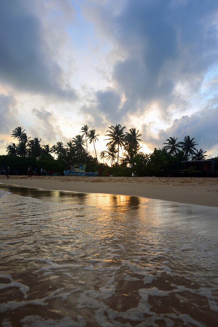 Unawatuna beach in Galle district at sunset, Sri Lanka