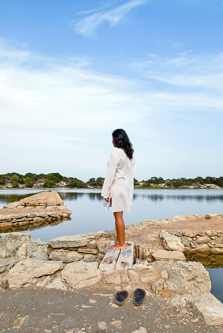 Young attractive woman relaxing in Formentera, Spain