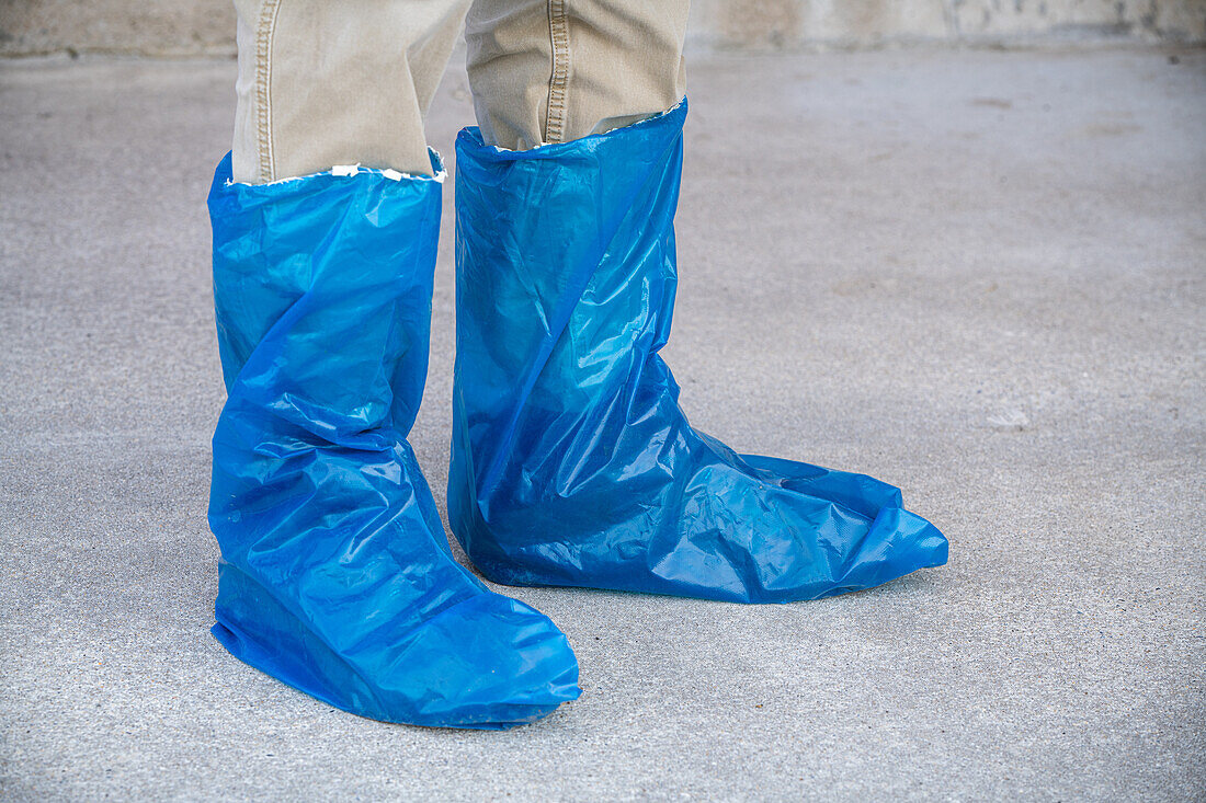 Poultry biosecurity shoe covers and avian influenza