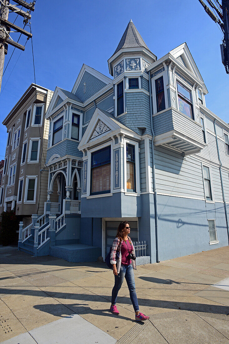 Young woman walking the streets of San Francisco, California.