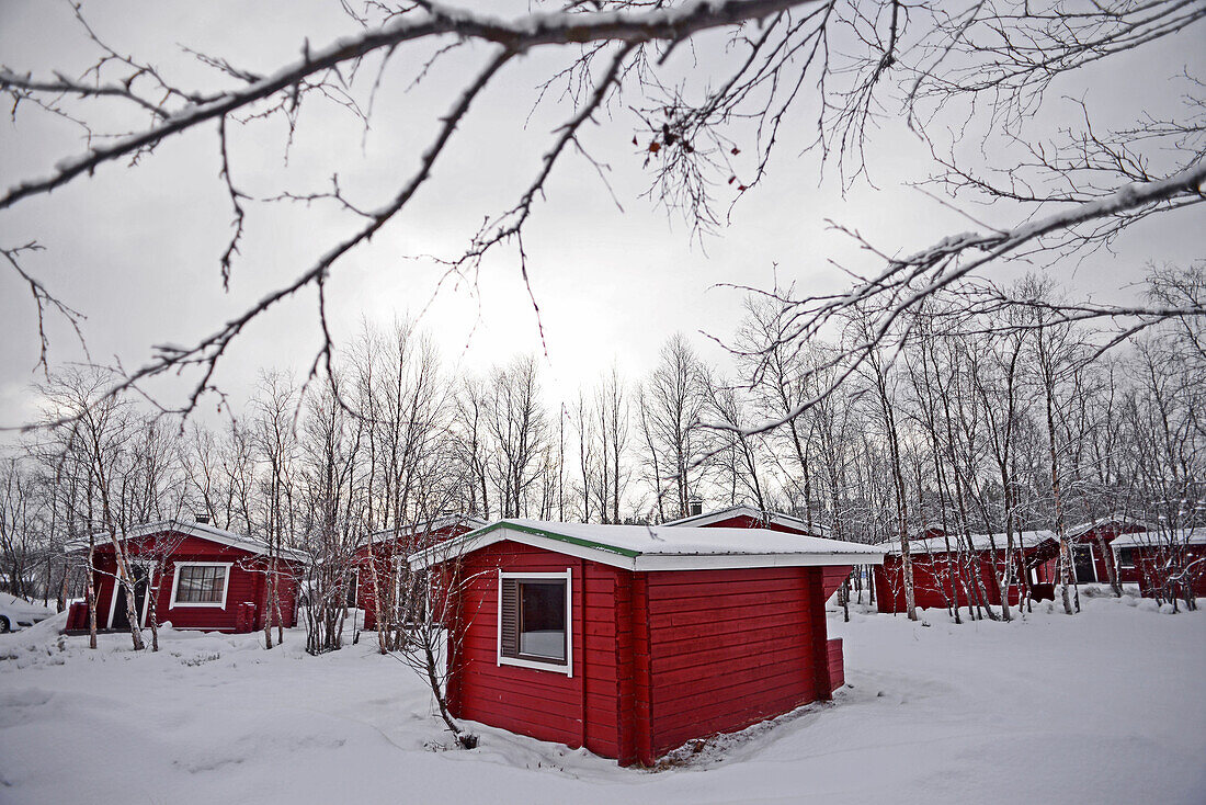 Wood cabins from VisitInari next to Lake Inari, Lapland, Finland