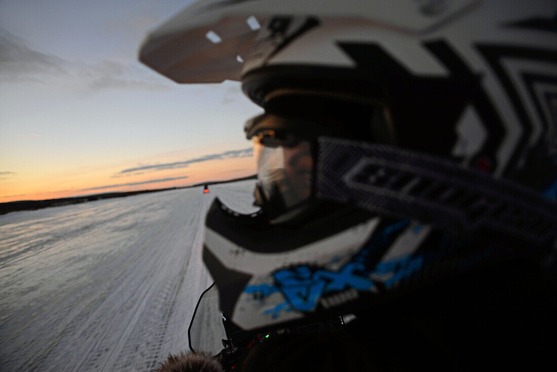 Snowmobile sunset tour with Arctic Lifestyle, Rovaniemi, Lapland, Finland.