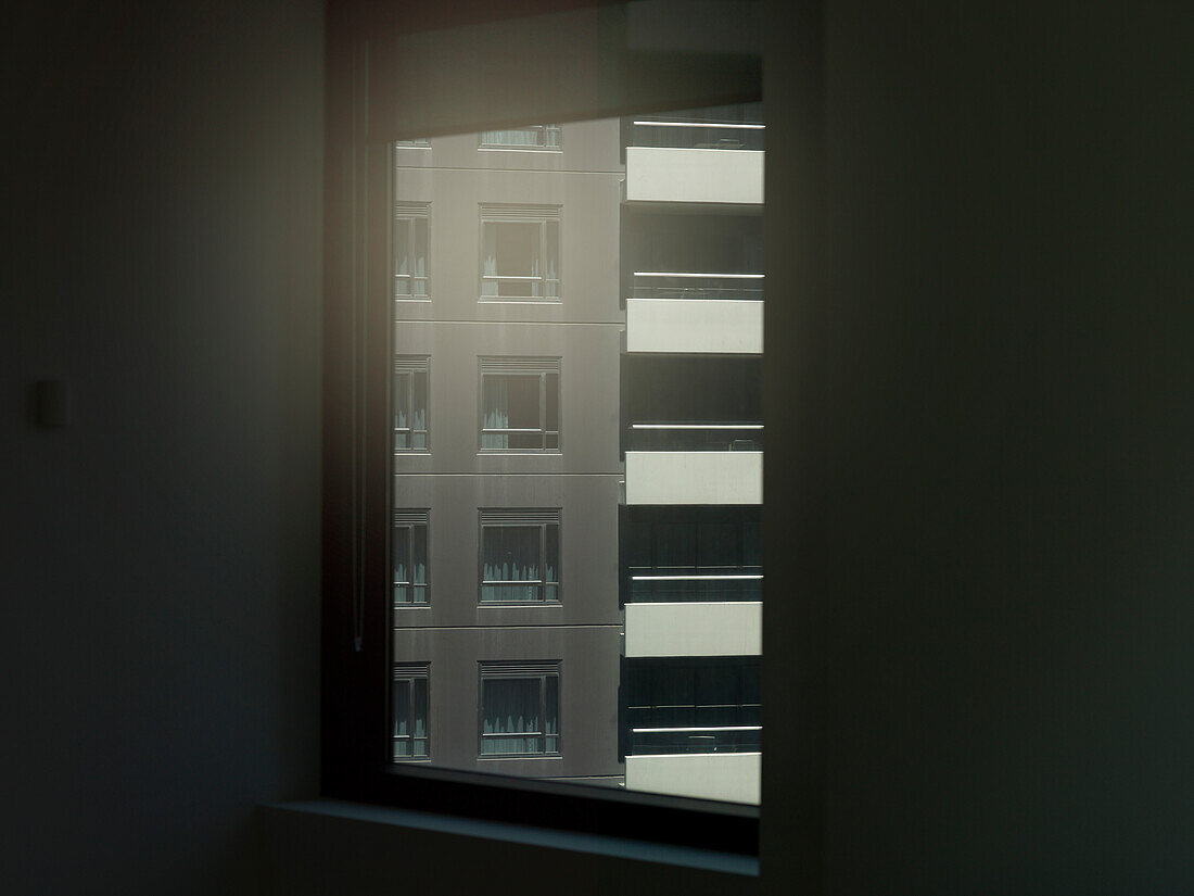 Exterior of residential building seen through window