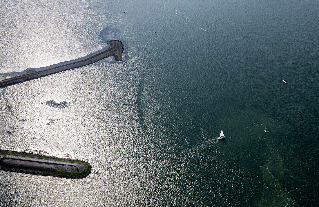 Netherlands, Zeeland, Zierikzee, Aerial view of sailboat at sea