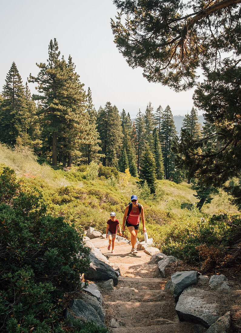 Mother with daughter (6-7) hiking