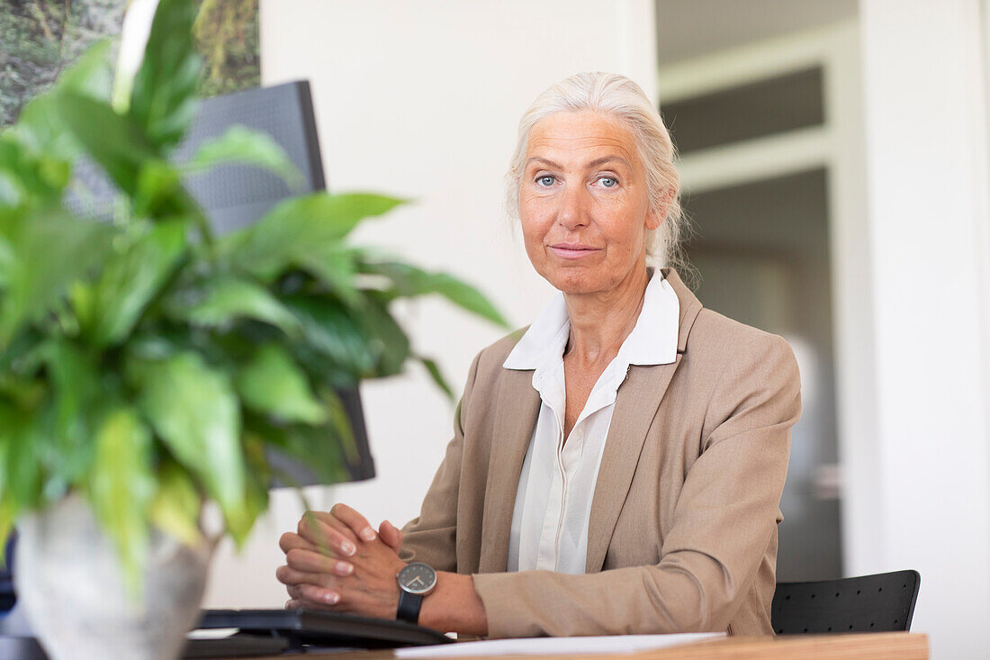 Portrait of mature businesswoman in office