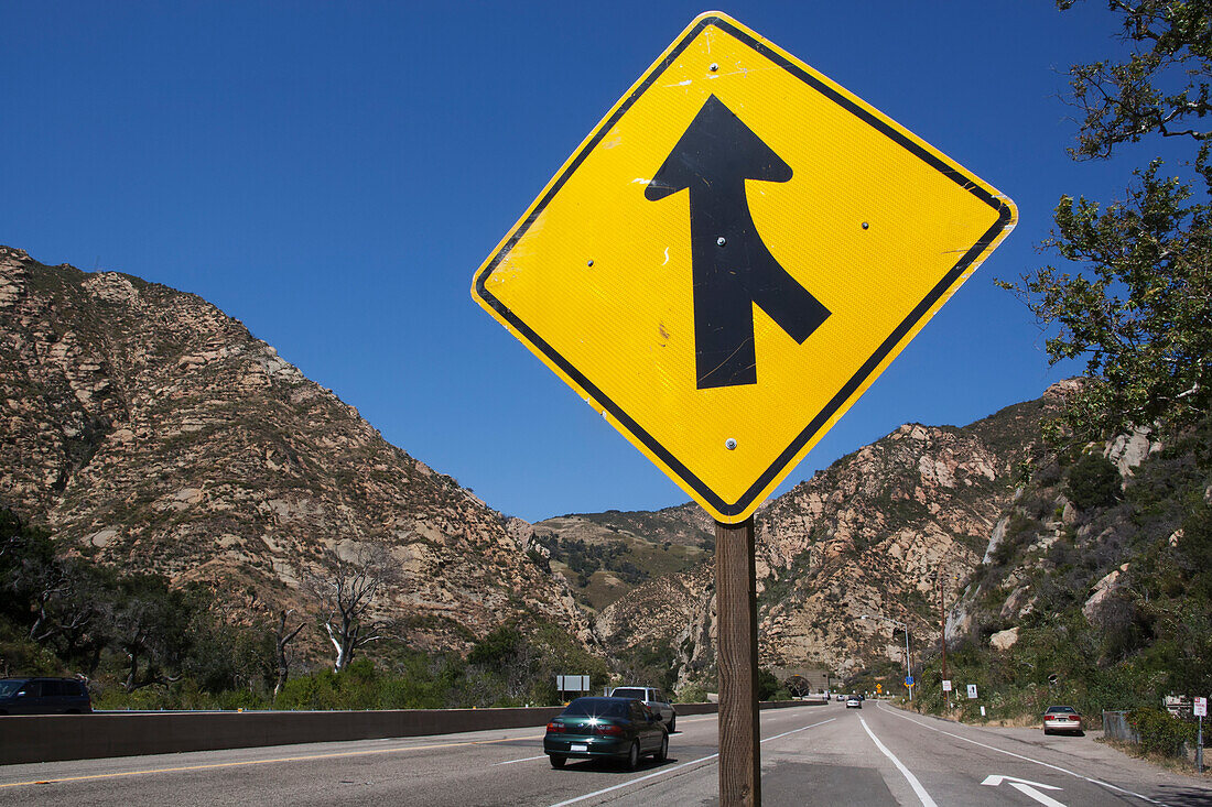 A Sign For A Road Merging; California, United States Of America