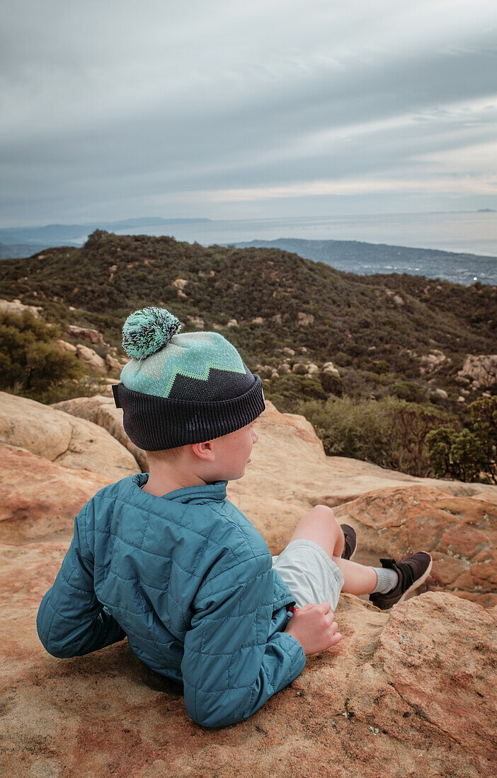 USA, California, Boy looking at landscape