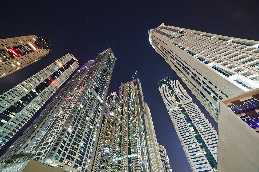 Skyscrapers Illuminated At Nighttime; Dubai, United Arab Emirates