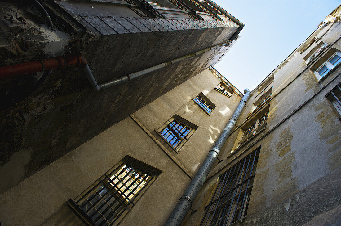 Low Angle View Up The Side Of Residential Buildings In The Historical District Of Marais; Paris, France