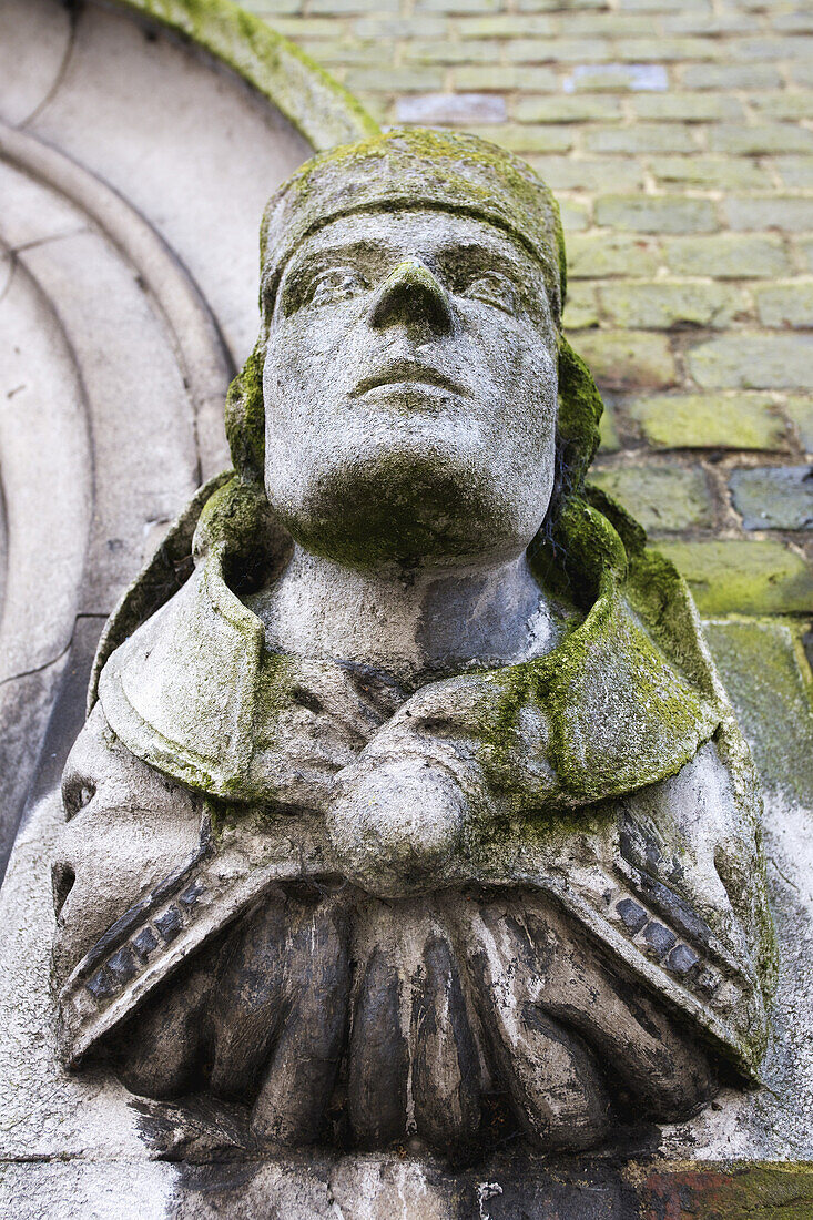 Statue Covered In Moss At Winchester College; Winchester, Hampshire, England