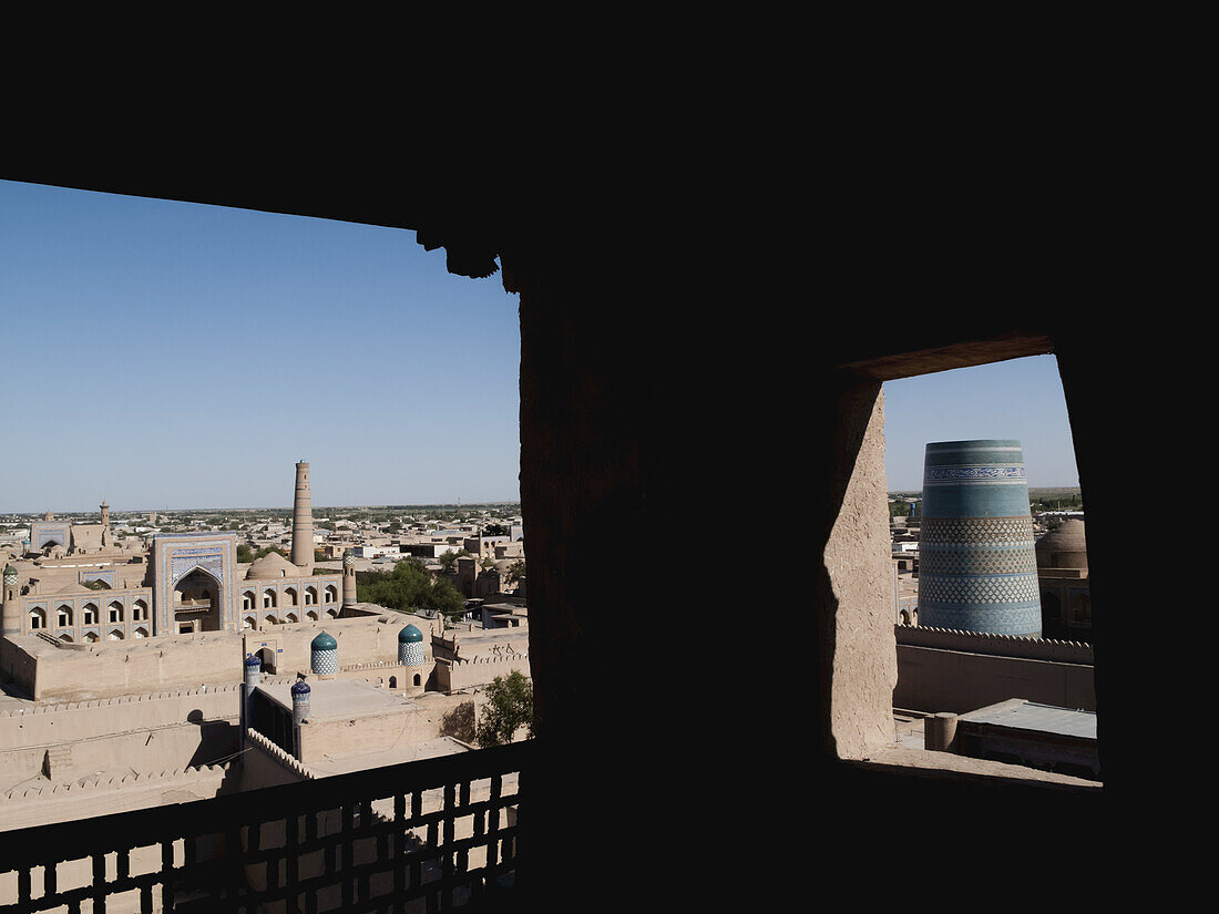 View From City Walls Of Mohammed Rakhim Khan Madrassah (Left) And Kalta Minar (Right), Ichan Kala Old City, Kizilkum Desert; Khiva, Khwarezm Region, Uzbekistan