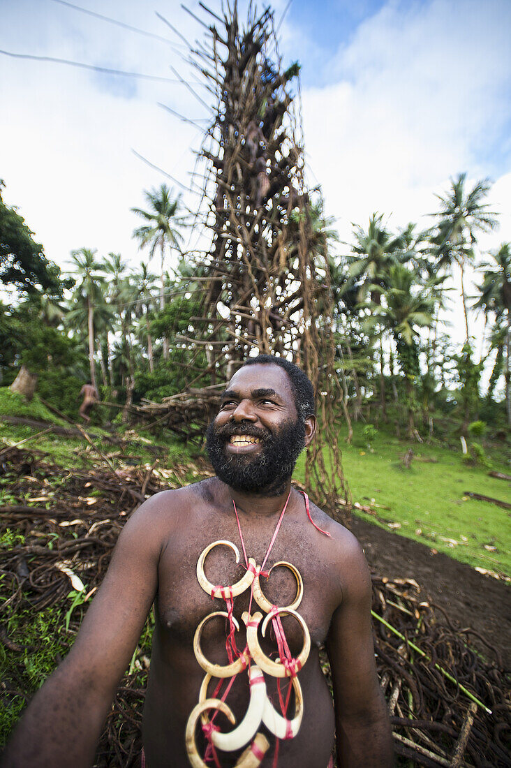 Pentecost Chief Stands Before A Land Diving Tower; Pentecost Island, Vanuatu