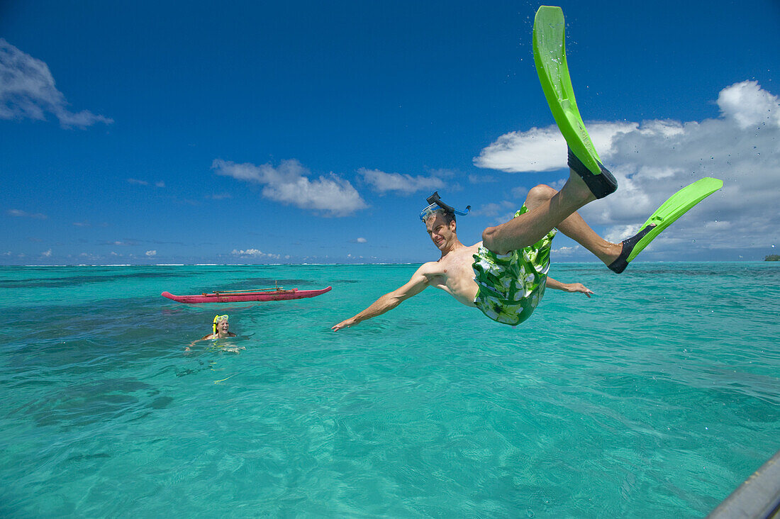 Playing In The Turquoise Water Off A Tropical Island; Upulu Island, Samoa